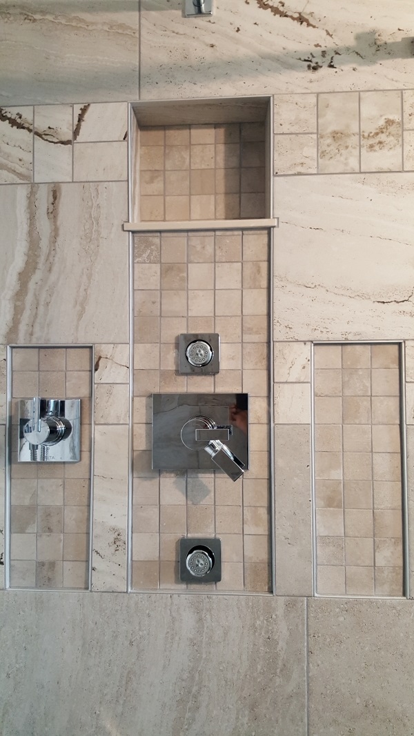 All tile shower with Delta faucet kit, diverter, body jets